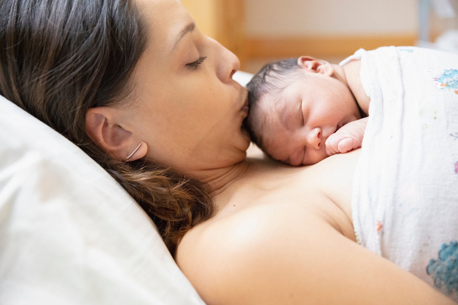 new born baby at hospital with mother